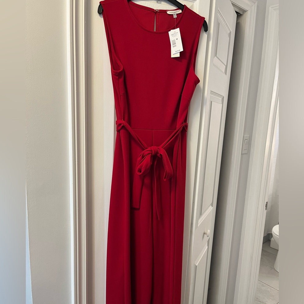 Red sleeveless pantsuit, new with tags.